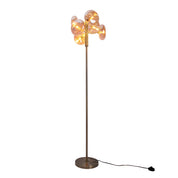 Tijdloze Artisan vloerlamp in amber met natuurlijke materialen