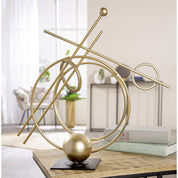 Orbit of creation gold metal sculpture