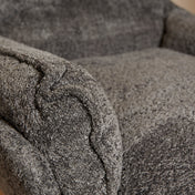 Lunara dark grey bouclé swivel armchair
